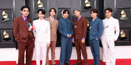 V, Suga, Jin, Jung Kook, RM, Jimin and J-Hope of BTS at the 64th annual Grammy Awards at MGM Grand Garden Arena on April 3, 2022 in Las Vegas, Nevada. 